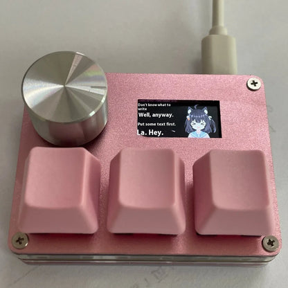 Magnetic axis numeric game keypad with programmable knob and colour screen on desk