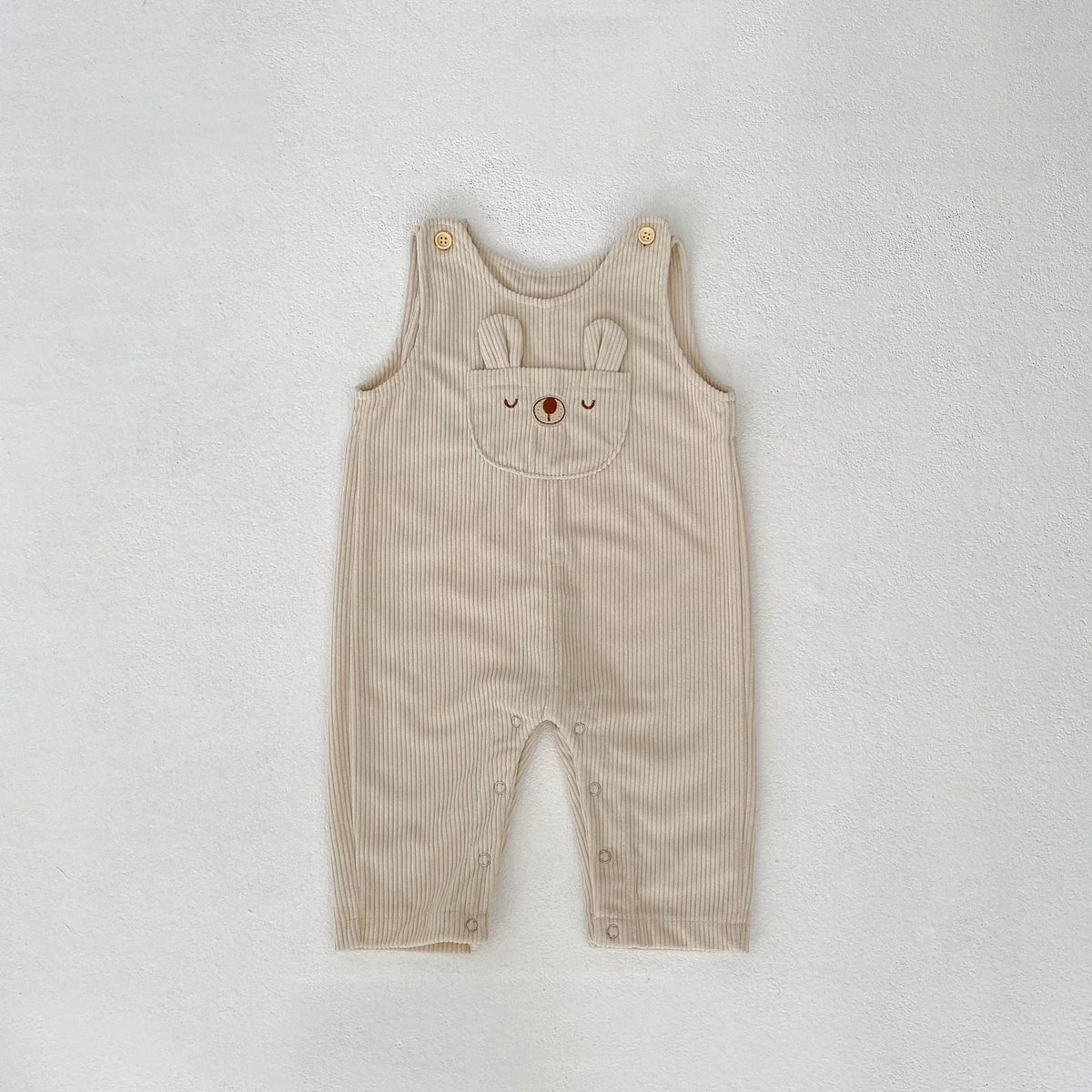 Infant clothing set with suspenders on corduroy trousers and long sleeve top