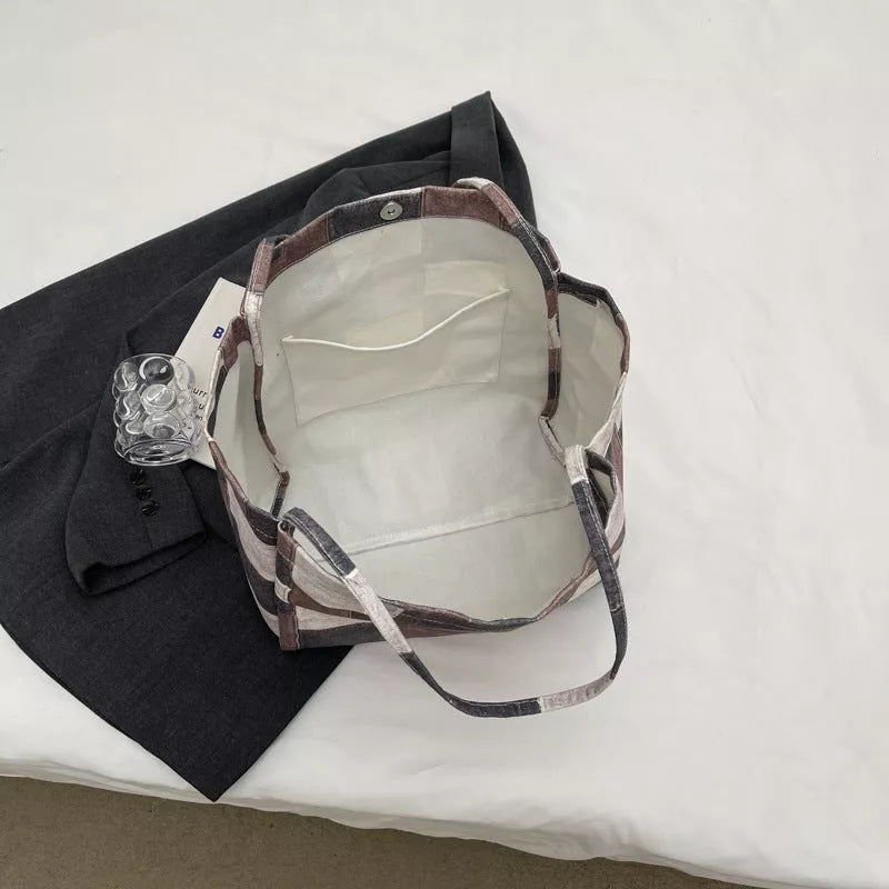 Women's denim tote bag with color-contrast check design for commute and leisure