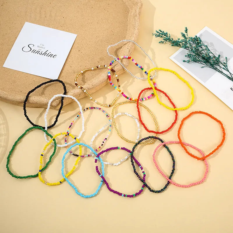 Handmade bohemian beaded bracelet set with 17 mixed material pieces in Set colour