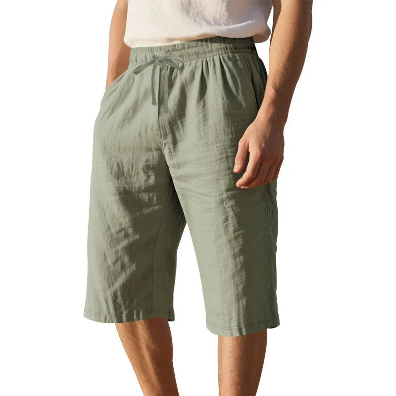 Men's linen shorts in light blue with drawstring waist and cropped straight-leg design