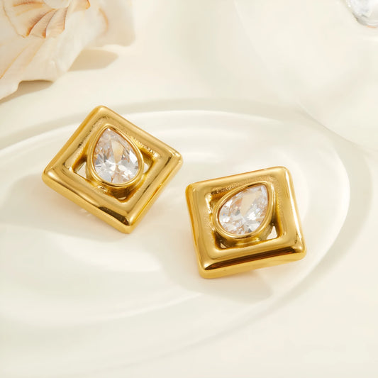 Gold geometric stud earrings for women with inlaid water drop zircon stones on a white background.