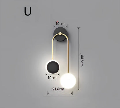 Nordic wall lamp with black gold finish and LED lighting, mounted beside bed with dimming controls