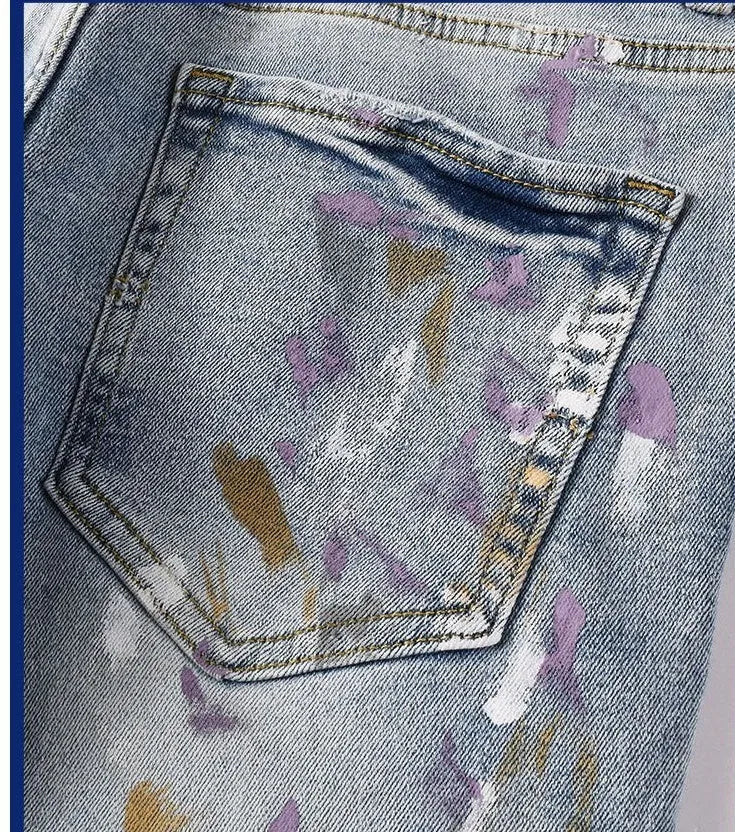 Men's light blue ripped slim fit jeans with tapered leg, double layer belt and zipper fly, sizes 28-40.