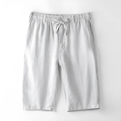 Man's loose-fit linen capri trousers in light colour for casual summer wear