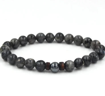 Stylish men's bracelet made with natural volcanic stone, flash stone, and wood chip in a geometric, mosaic-like design