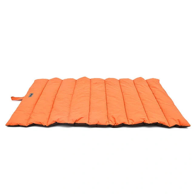 Waterproof and bite-resistant pet mat in brilliant blue, green, light blue, and orange
