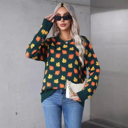 Beige and dark green Christmas sweater with maple leaf design, round neck, and loose fit