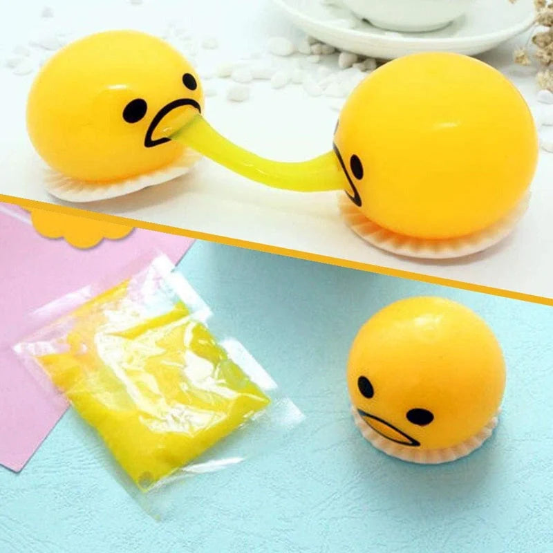 Gudetama Vomiting Egg Toy in green, orange, pink, and yellow for stress relief and fun