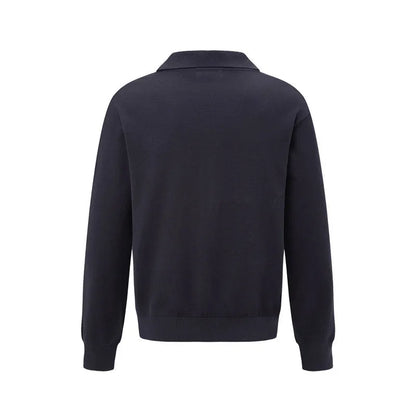 Loose fit acrylic blend pullover sweater in beige, shown on a model for casual wear.