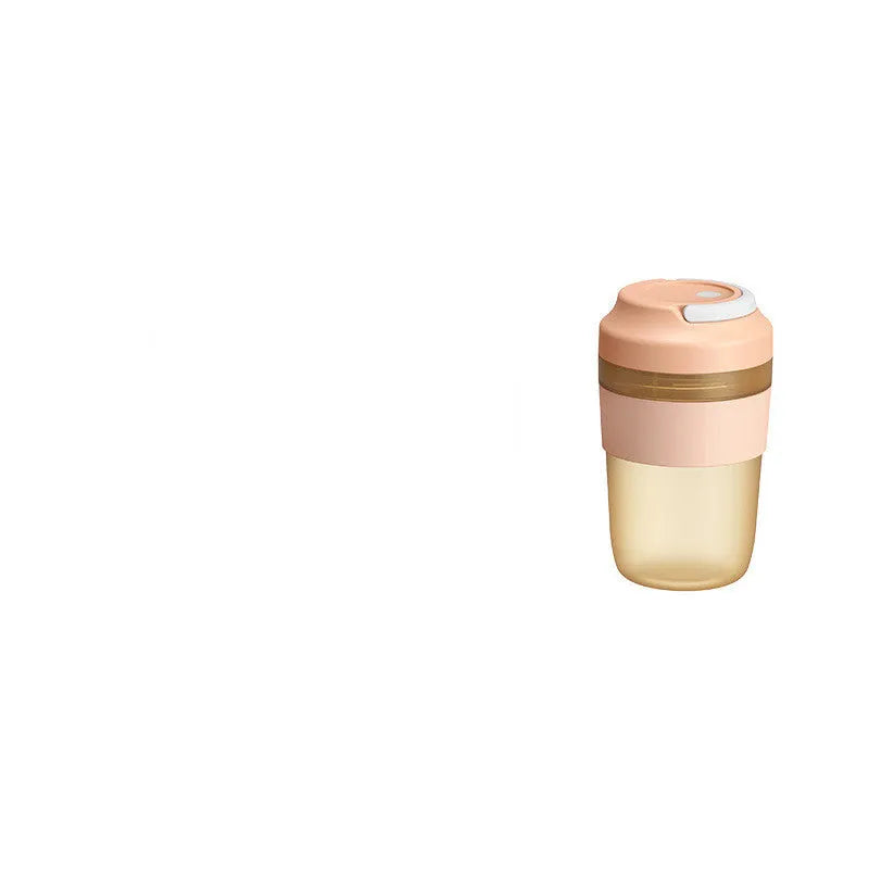 Green portable USB rechargeable blender cup with lid and four stainless steel blades, 400ml capacity.