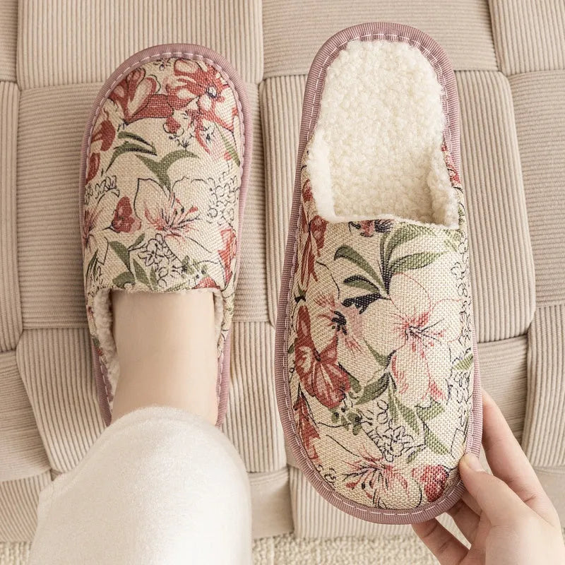 Pair of floral cotton slippers with linen-texture upper and light PVC sole for home wear.