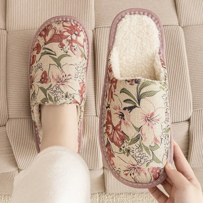 Pair of floral cotton slippers with linen-texture upper and light PVC sole for home wear.