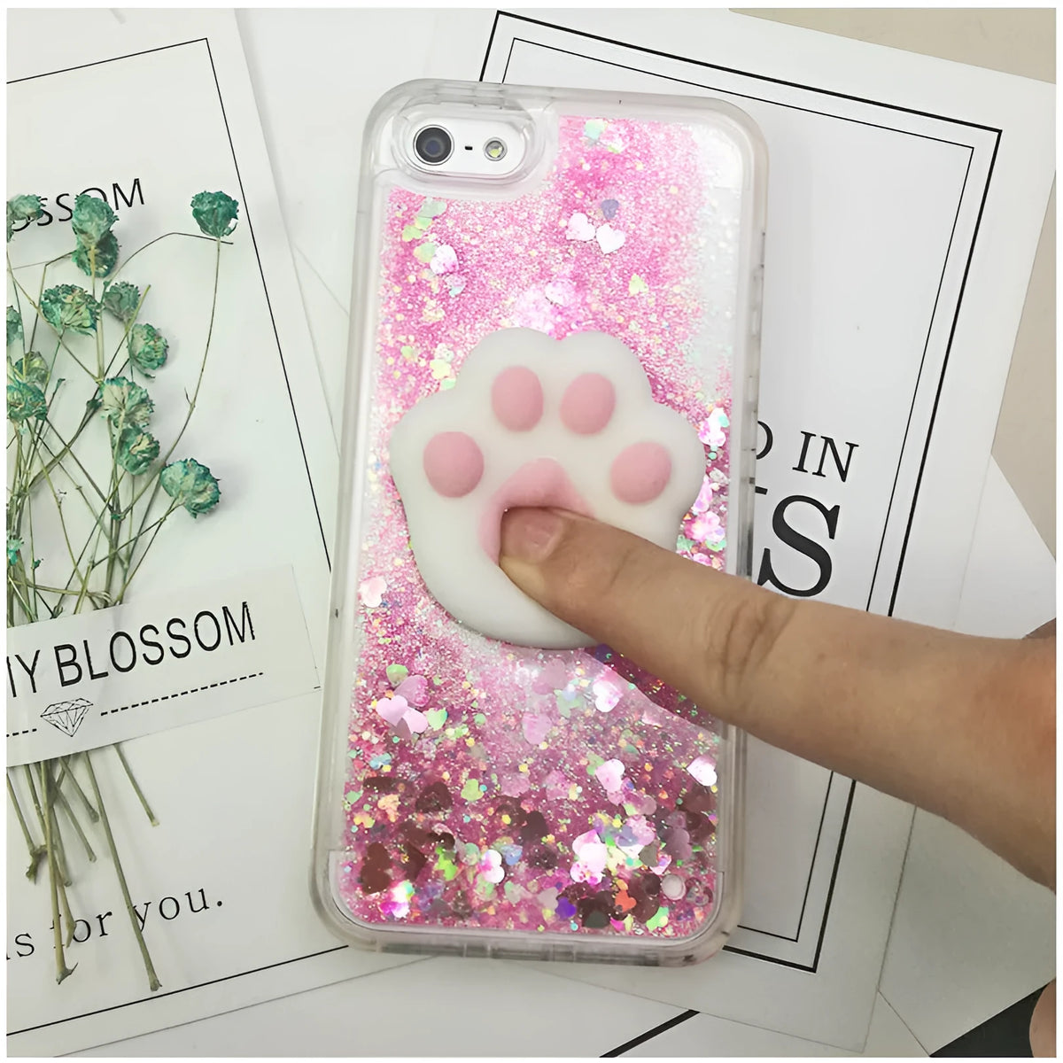 Quicksand squeezing toy iPhone case in TPU with cartoon animal design, shown in pink, cyan and purple shells