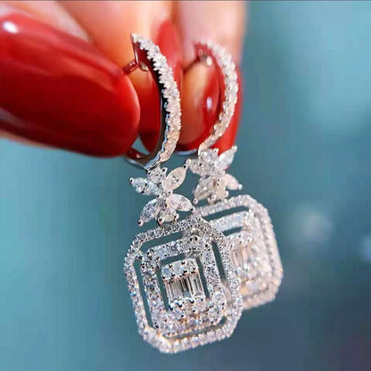 Elegant micro-set zirconia bow earrings for women, perfect for adding sparkle to any outfit.