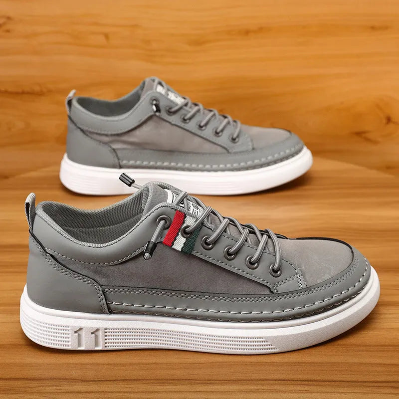Men's grey high-top canvas sneakers with bandage dress style and rounded toe on PVC sole