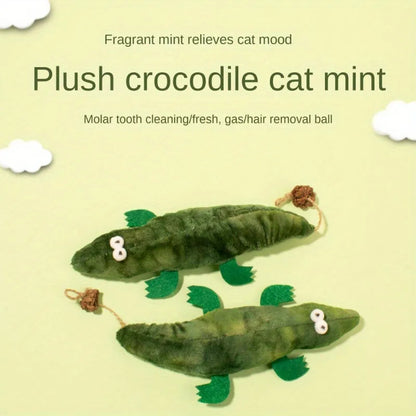Green alligator plush cat toy with textured surface for dental cleaning filled with catnip and peppermint