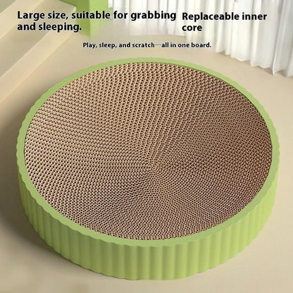 Green round cat scratching board measuring 55cm with corrugated paper surface and two replacement inserts