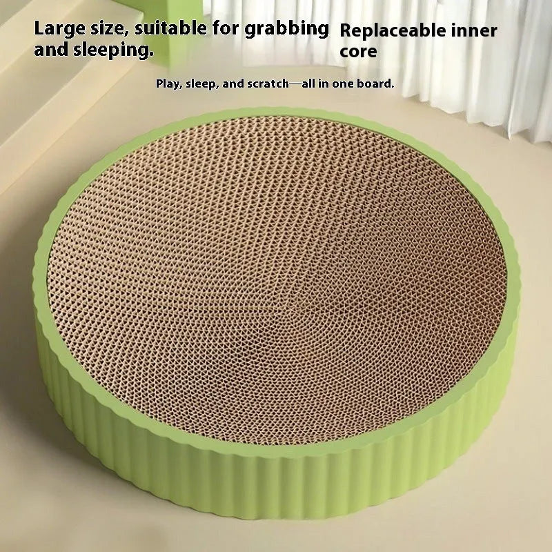 Round green cat scratching board measuring 55cm with corrugated paper surface and two replacement refills