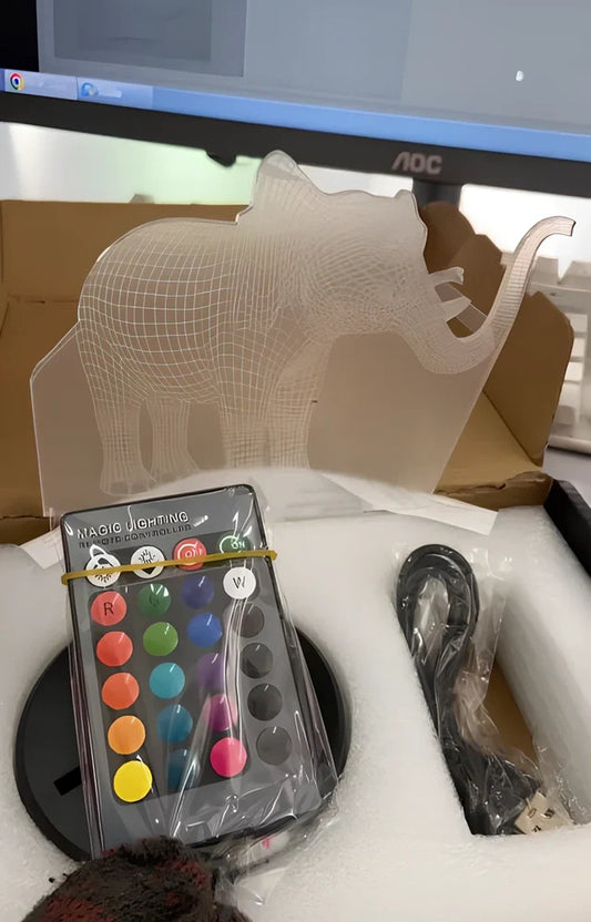 3D elephant LED table lamp with colourful illumination and touch control base measuring 87x87x42mm