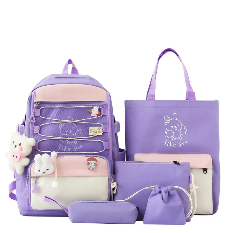 Nylon junior high school backpack in solid colour with curved shoulder straps and organisational compartments