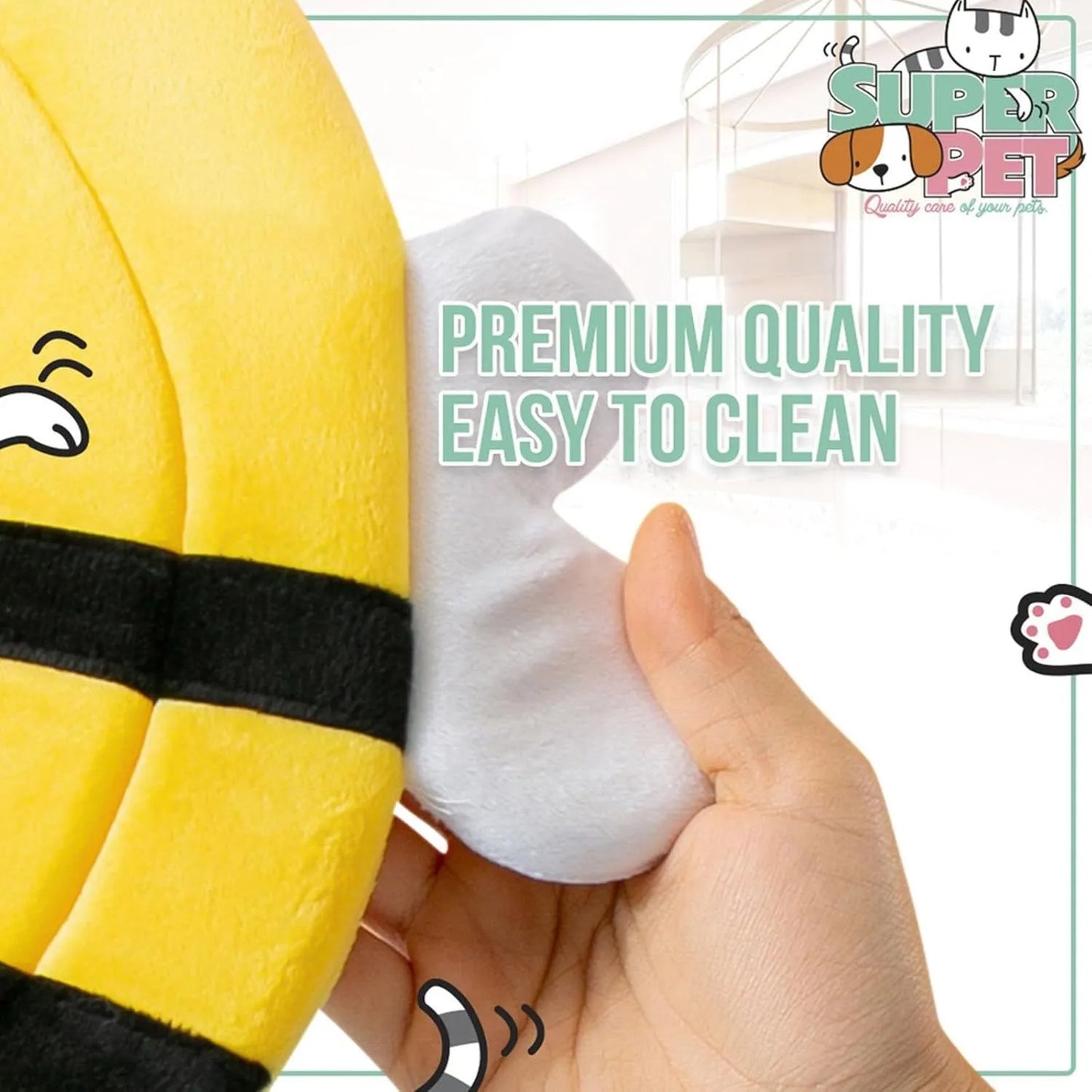 Soft fabric cat cone collar with cute bee design and Velcro closure on a table