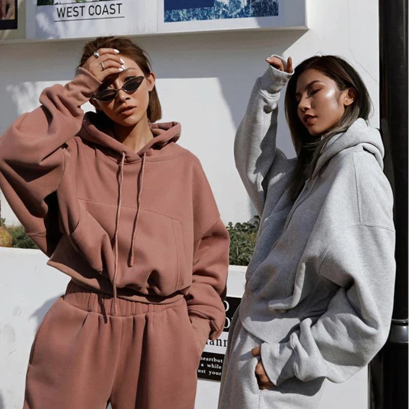 Women's casual hoodie outfit in various colors and sizes, featuring a stylish design and comfortable polyester construction.