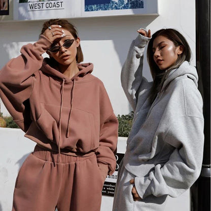 Women's casual hoodie outfit in various colors and sizes, featuring a stylish design and comfortable polyester construction.