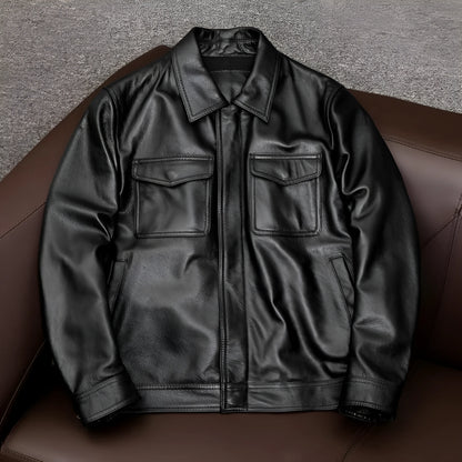 Man's black lapel PU leather jacket with side seam pockets, shown on a hanger.