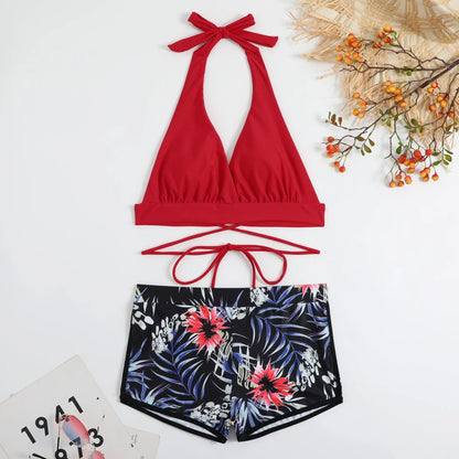 High waist split bikini in peacock green, red, or black, nylon outer with polyester lining, sizes S to XL