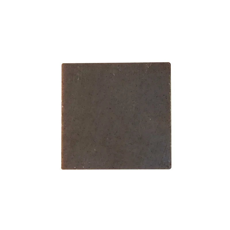 72g bar of nine grass cold process shampoo soap on a plain background.