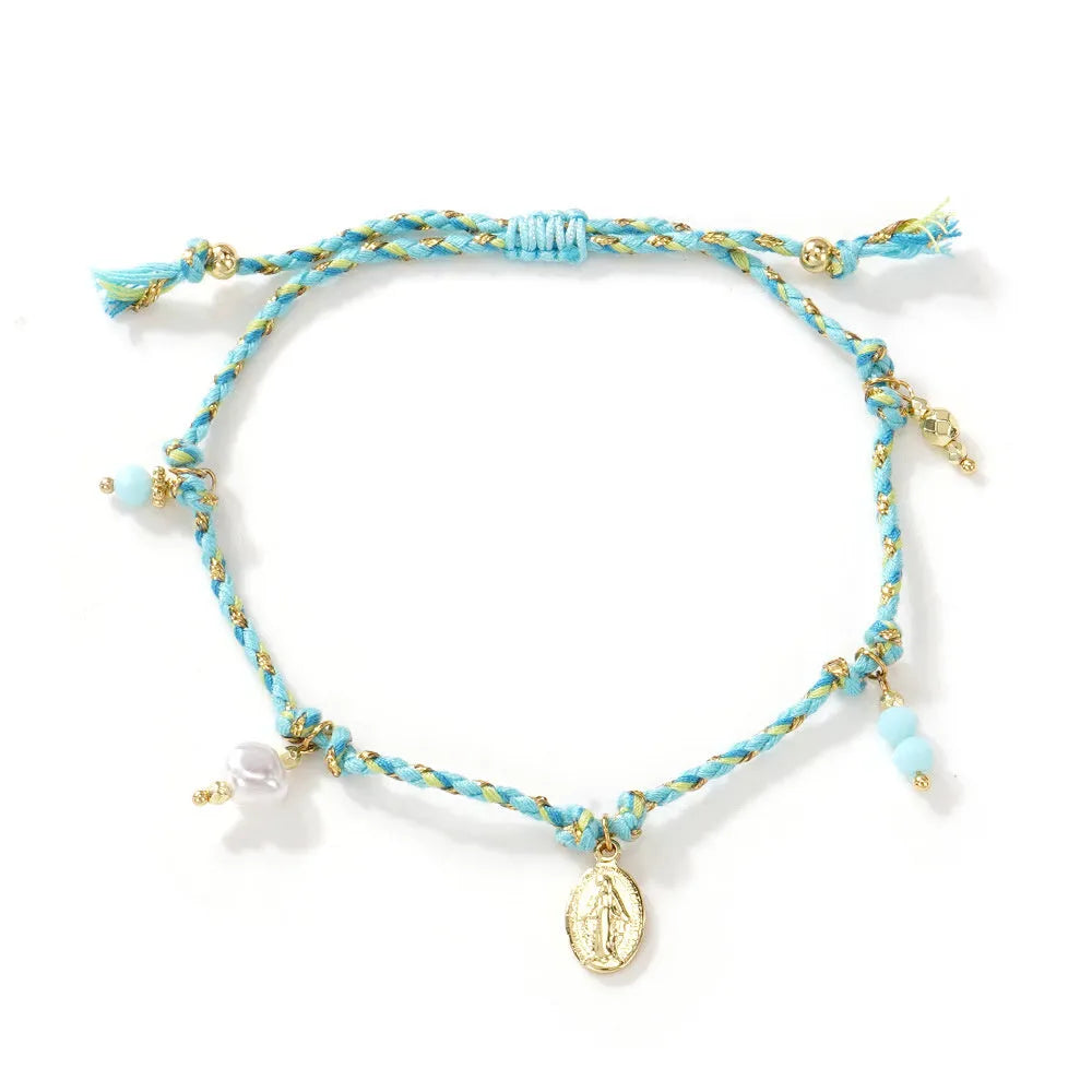 Close-up of a colourful hand-woven braided rope bracelet for women, showing ethnic strap design.