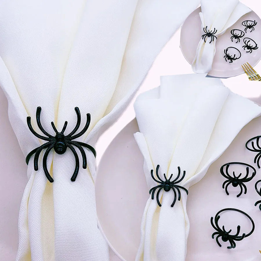 Six black spider-shaped alloy napkin rings with electrophoresis coating for Halloween table settings