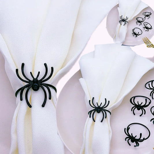 Six black spider-shaped alloy napkin rings with electrophoresis coating for Halloween table settings