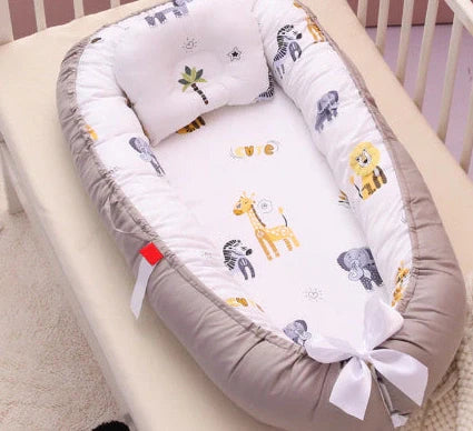 Portable cotton crib bed folded and unfolded showing 97x46cm dimensions and Banana leaf pattern
