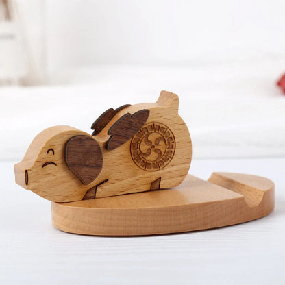 A beechwood lazy phone holder with customizable engraving, showcasing a minimalist and versatile design for easy phone access and personalization.