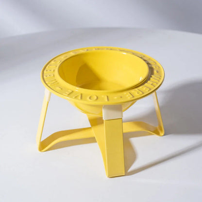 Ceramic cat bowl with iron anti-tip frame in blue colour with silicone pad