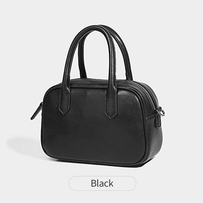 Retro square PU leather messenger bag with an adjustable shoulder strap in black colour.