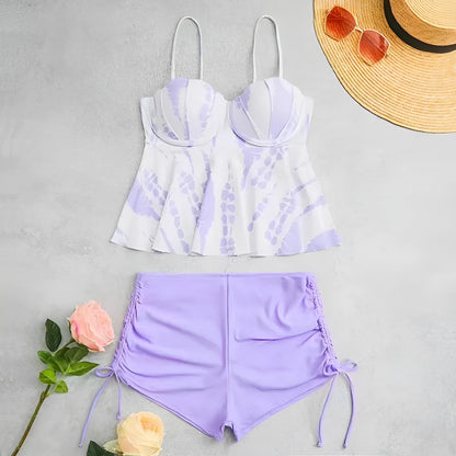 Women's hard bag printed split bikini swimsuit set in blue colour.