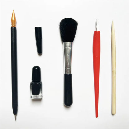 Scratch art repair kit with scraper pen, repair solution, brush, small scraper, and bamboo stick components