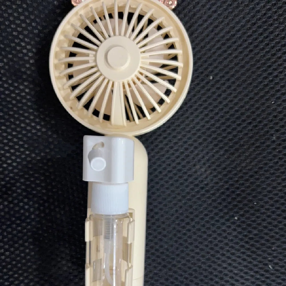 Plastic nozzle fan in multiple colours with USB charging cable, measuring 20cm long on desk surface