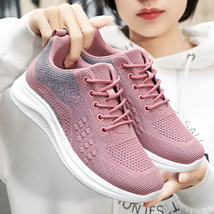 Women's black mesh sneakers with round toe and lace-up design showing breathable construction