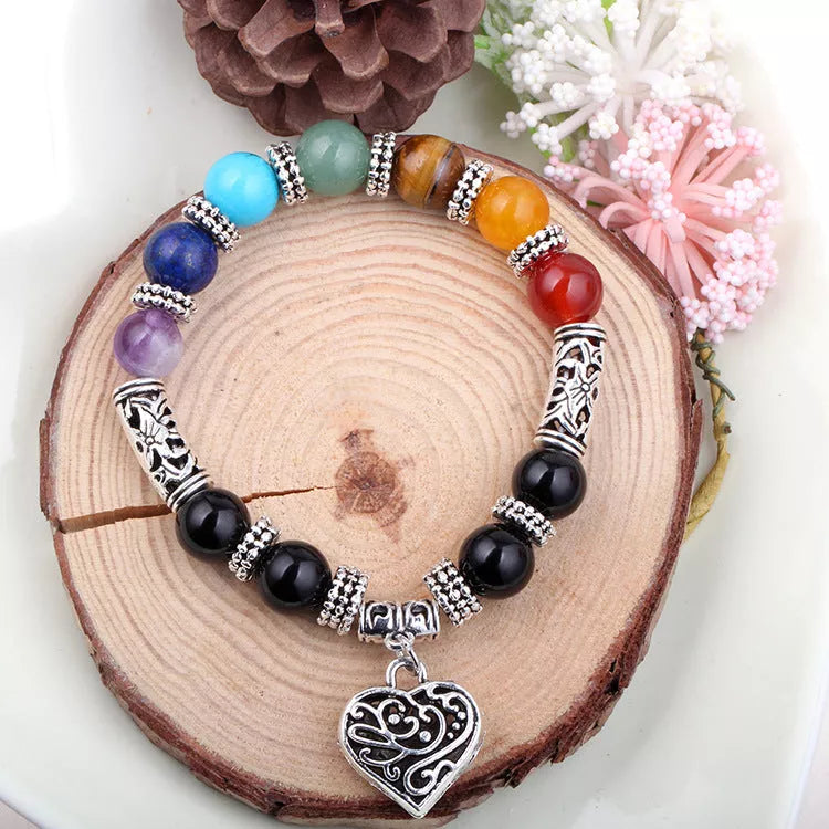 Seven Chakra Yoga Energy Bracelet with adjustable length and symbolic design for energy balance