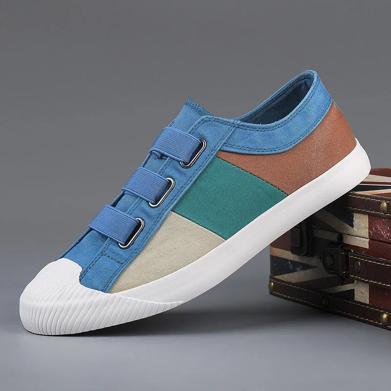 Men's canvas casual sneakers with elastic band fastening and vulcanised rubber sole in multiple colour options