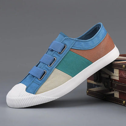 Men's canvas casual sneakers with elastic band fastening and vulcanised rubber sole in multiple colour options