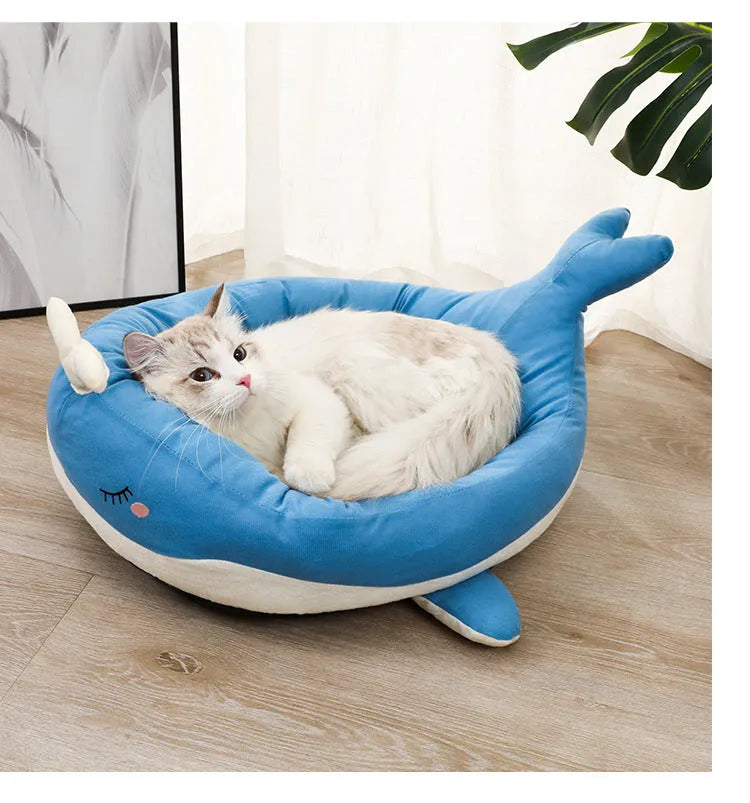 Blue duck shape fluffy pet bed sofa for small dogs and cats on a wooden floor
