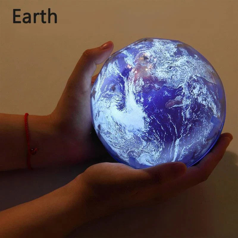 Enchanting star projector lamp with interchangeable film slides showcasing the universe, ocean, and holiday motifs