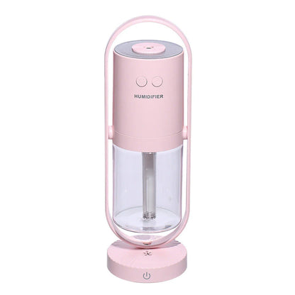 Compact desktop humidifier with starry projection feature, designed to improve air moisture and create a relaxing ambiance.