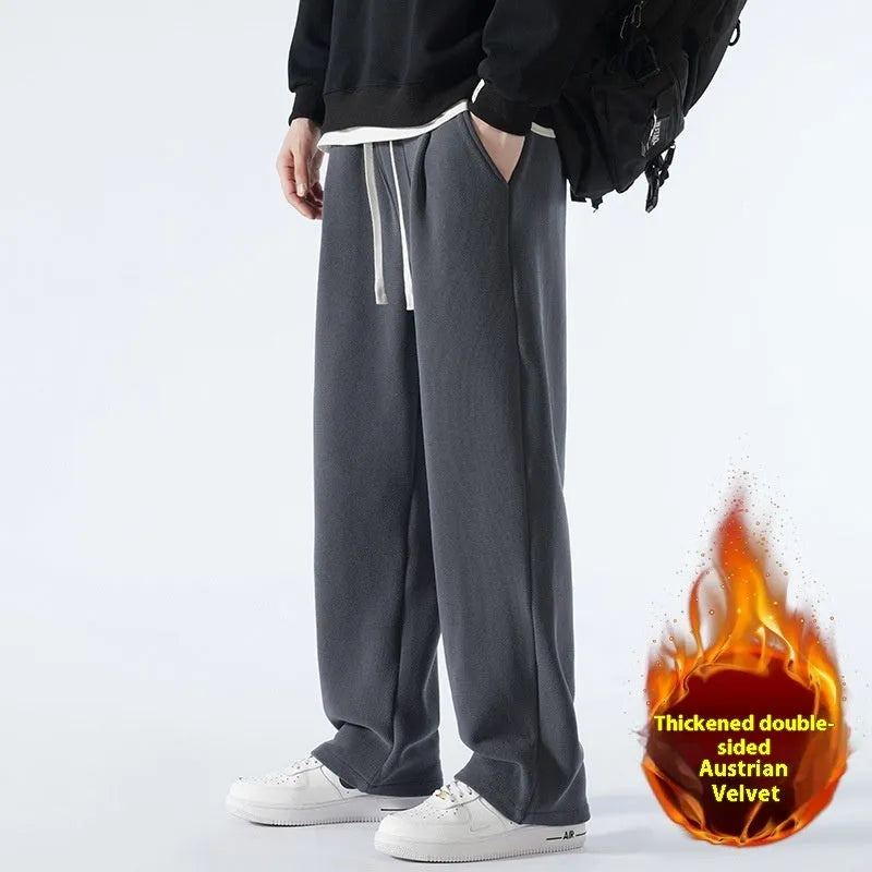 Men's double-sided polar fleece-lined trousers in apricot, black, or dark grey with elastic waist and loose fit for winter.