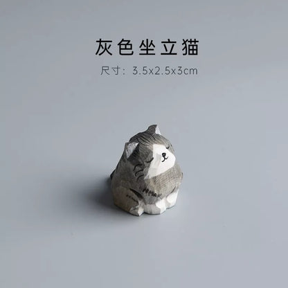 Handmade wooden cat trinkets in gray and orange, perfect for decor or gifts